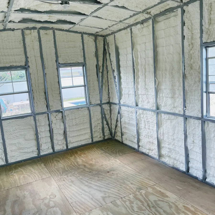 Closed-cell spray foam insulation applied to wall cavities in a residential project in Hilltown